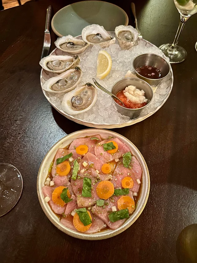 Lowland signature dishes Celery Salad, 24hr Short Rib, Carolina Shrimp Cocktail, Steamboat Creek Oysters